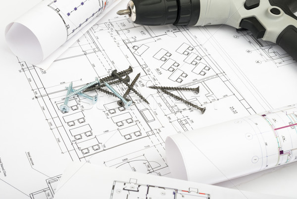 Architecture plan and rolls of blueprints Stock photo © cherezoff