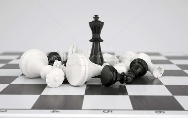 Black chess king in the midst of battle Stock photo © cherezoff