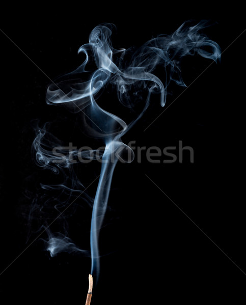 Movement of white smoke on black Stock photo © cherezoff