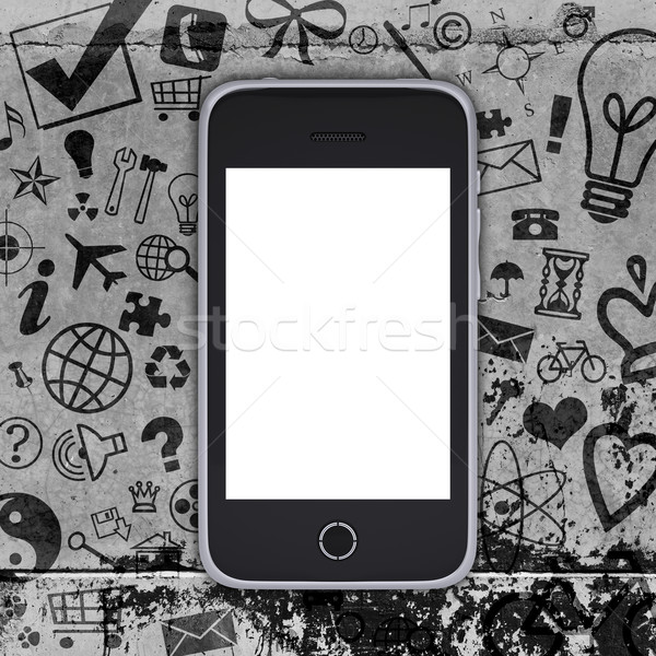 Smart phone on concrete floor with various social icons Stock photo © cherezoff