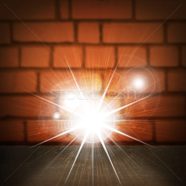 Abstract background is red brick wall, concrete floor and light at center Stock photo © cherezoff