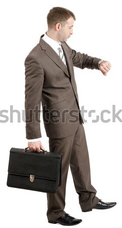 Empresario caminando maleta aislado blanco oficina Foto stock © cherezoff