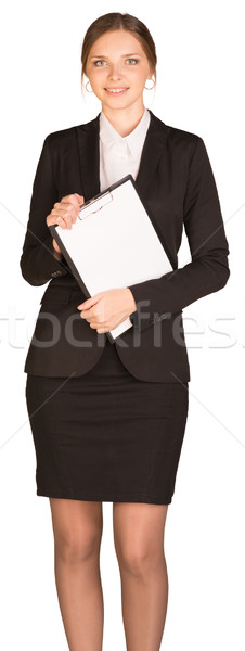 Mujer de negocios stand papel aislado blanco Foto stock © cherezoff