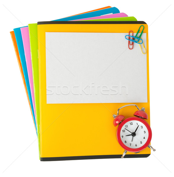 Colorful copybooks with empty card and alarm clock Stock photo © cherezoff