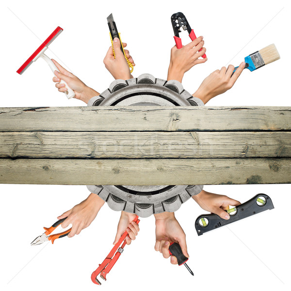 Peoples hands holding tools on white Stock photo © cherezoff