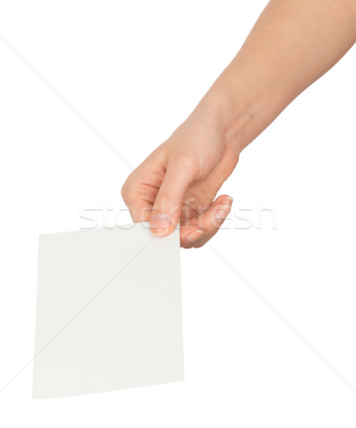 Womans right hand offering blank paper Stock photo © cherezoff