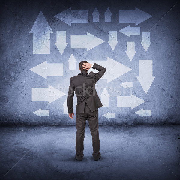 Businessman in front of different ways Stock photo © cherezoff