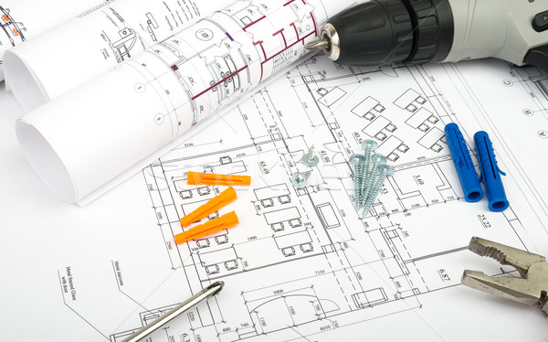 Architecture plan and rolls of blueprints Stock photo © cherezoff