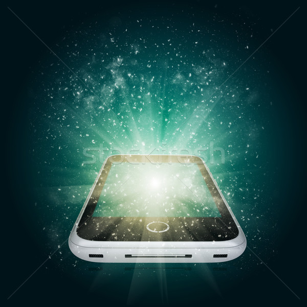 Smart phone with magic light and falling stars Stock photo © cherezoff