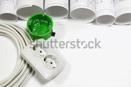 Architectural drawings scrolls with electrical cable, LED bulb and enclosures Stock photo © cherezoff