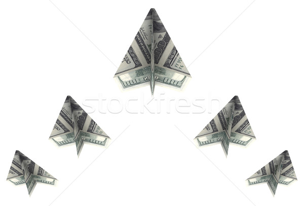 wedge of paper airplanes out dollars rise up Stock photo © cherezoff