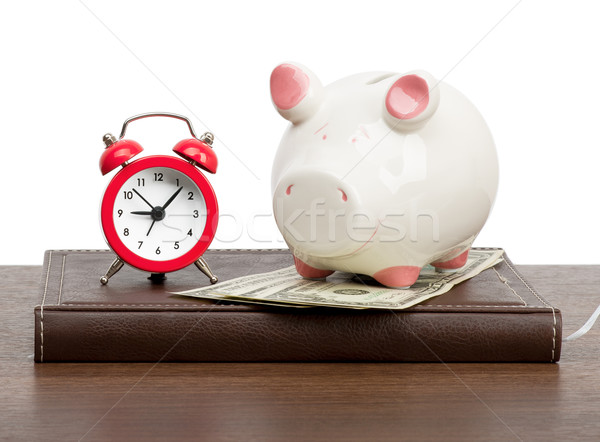 Alarm clock with piggy bank Stock photo © cherezoff