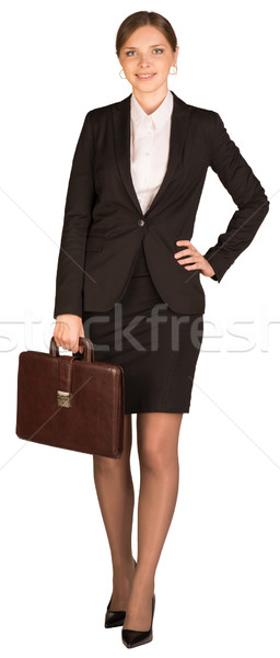 Mujer de negocios stand maletín mano aislado Foto stock © cherezoff