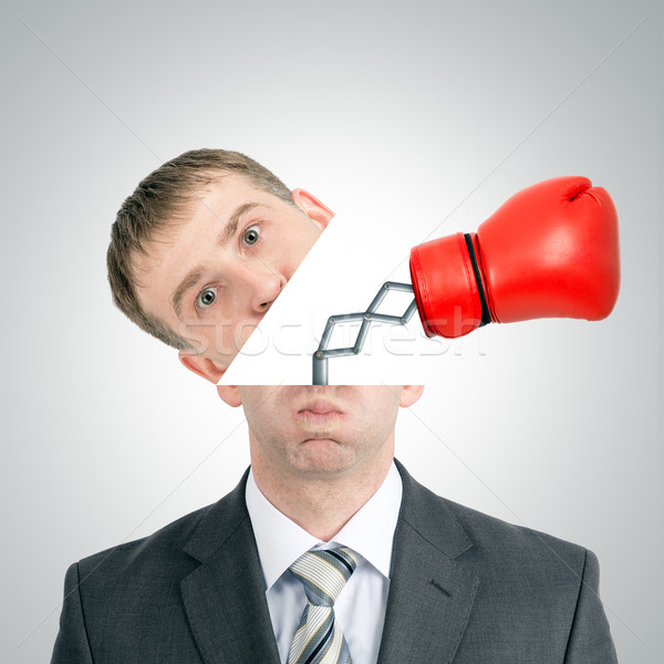 Boxing glove beating from businessmans head Stock photo © cherezoff
