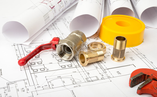Stock photo: Architecture plan and rolls of blueprints