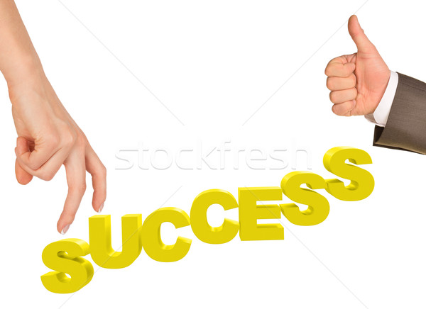 Womans fingers stepping on word success Stock photo © cherezoff
