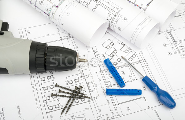 Architecture plan and rolls of blueprints Stock photo © cherezoff