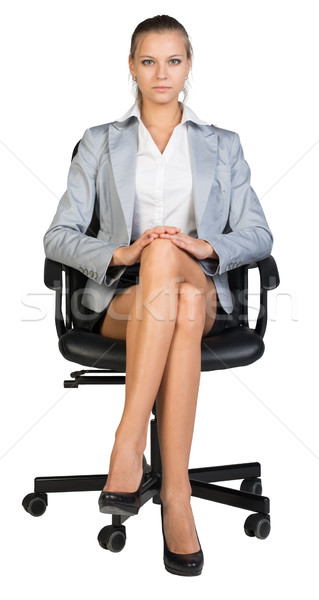 Businesswoman on office chair Stock photo © cherezoff