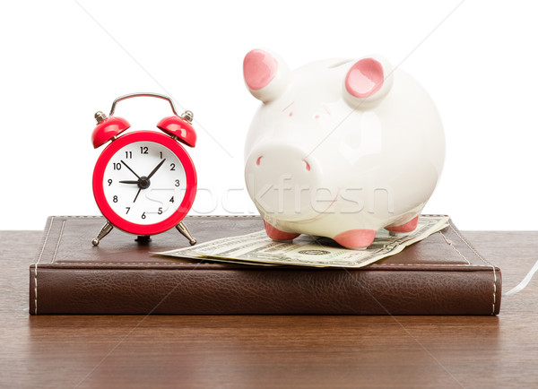 Alarm clock with piggy bank Stock photo © cherezoff