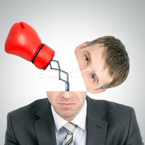 Boxing glove beating from businessmans head Stock photo © cherezoff