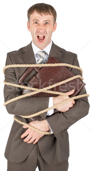 Businessman tied with rope screaming Stock photo © cherezoff