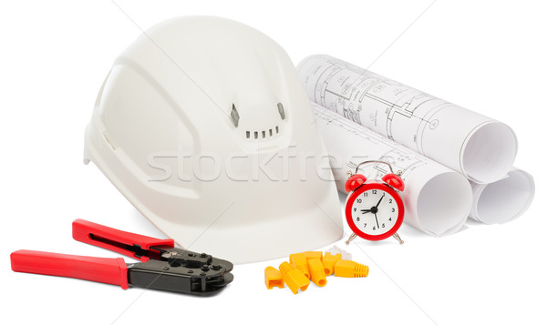 Blueprint rols and helmet with tools Stock photo © cherezoff