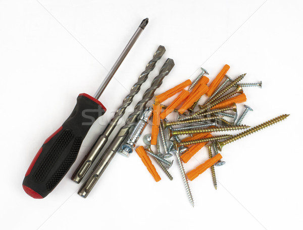 Screwdriver, drill and screws Stock photo © cherezoff