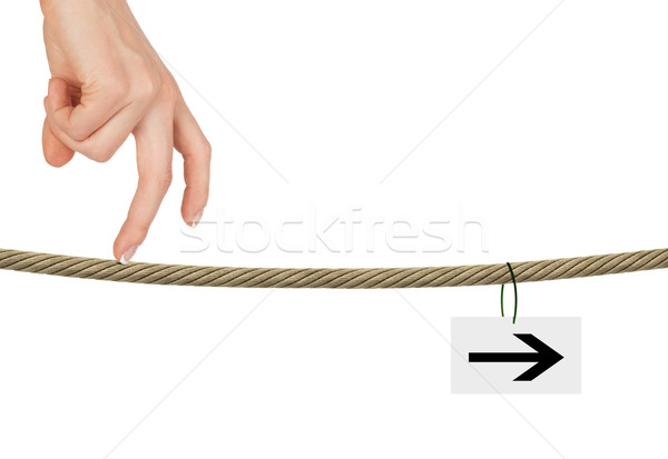 Womans fingers walking on rope Stock photo © cherezoff
