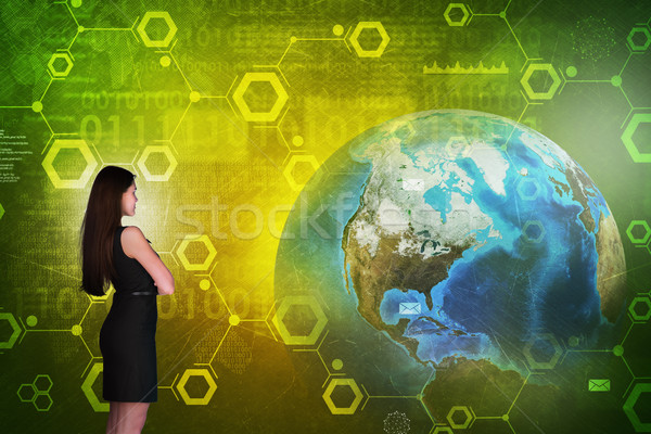 Business woman in front of holographic screen Stock photo © cherezoff