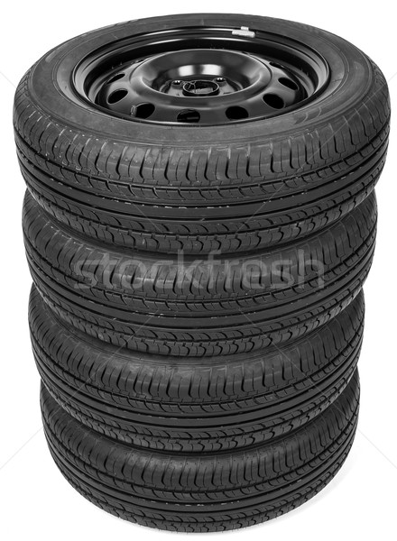 Stack of four wheel black tyres for summer Stock photo © cherezoff