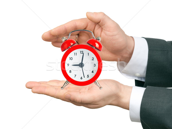 Male hands holding alarm clock Stock photo © cherezoff