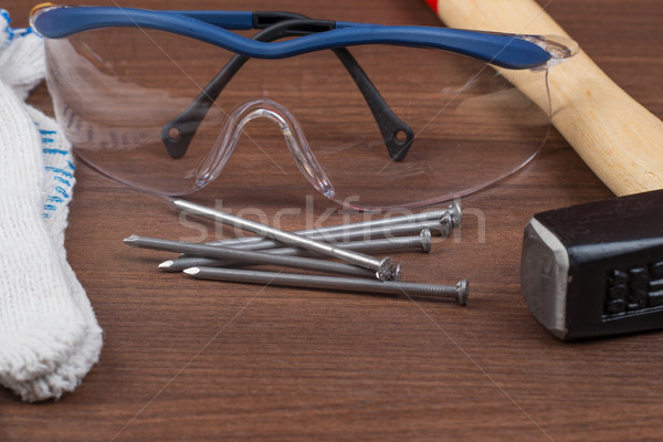 Working tools with protective gloves Stock photo © cherezoff
