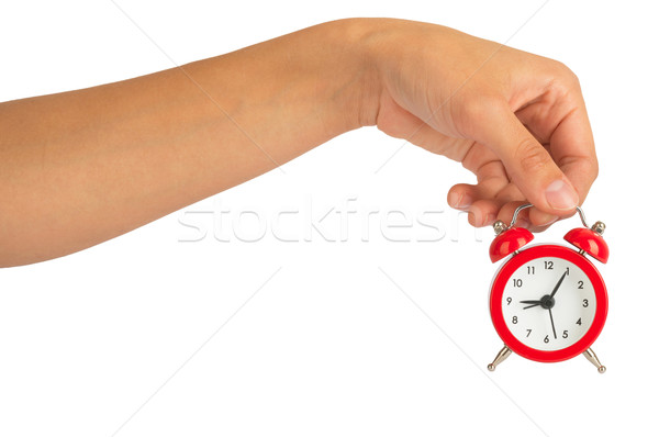 Humans hand holding alarm clock Stock photo © cherezoff