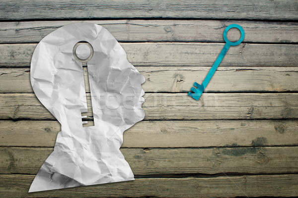 Paper humans head with key symbol Stock photo © cherezoff