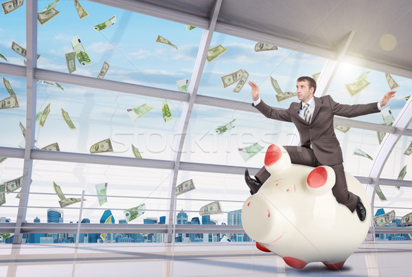 бизнесмен сидят белый Piggy Bank служба лице Сток-фото © cherezoff