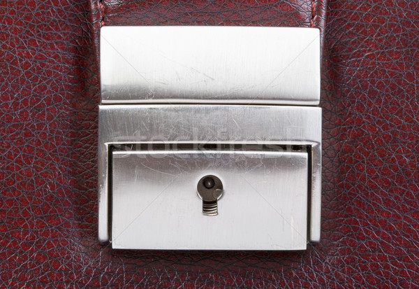 Kilitlemek anahtar deliği kahverengi evrak çantası görmek Stok fotoğraf © cherezoff