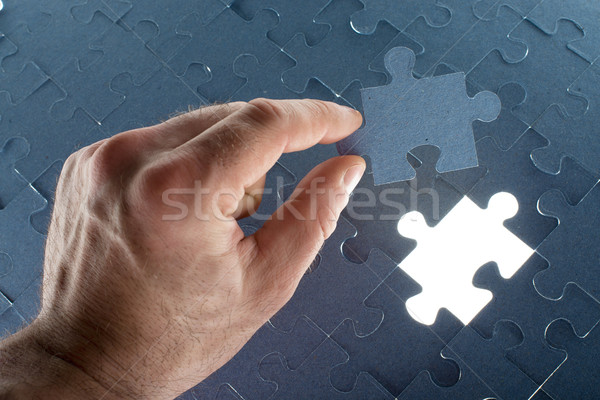 Missing jigsaw puzzle piece with light glow Stock photo © cherezoff