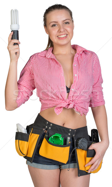 Mujer herramienta cinturón lámpara mirando Foto stock © cherezoff