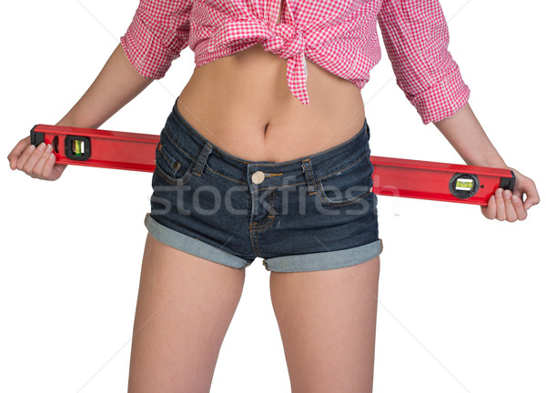 Woman holding builders level Stock photo © cherezoff