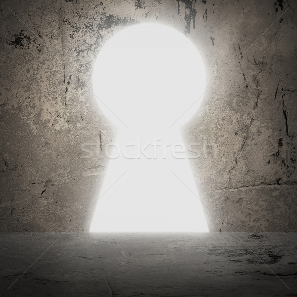 In concrete wall doorway as keyhole. Bright light Stock photo © cherezoff