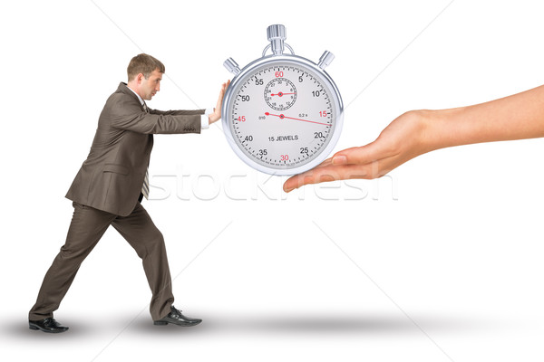 Stock photo: Hand giving timer to businessman