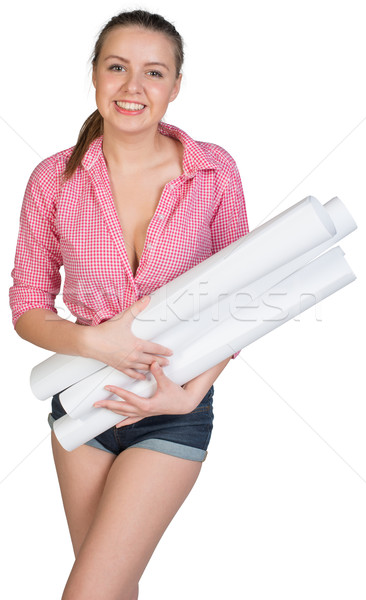 Woman holding drawing rolls Stock photo © cherezoff