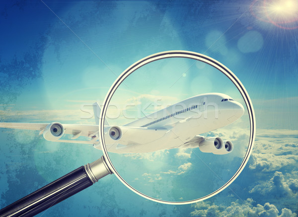 Stock photo: Jet under magnifier, close-up view