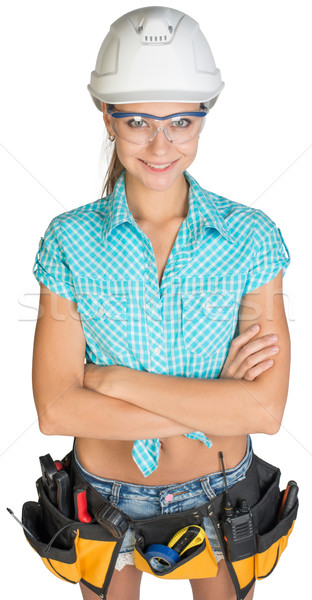 Woman in hard hat, tool belt and protective glasses Stock photo © cherezoff