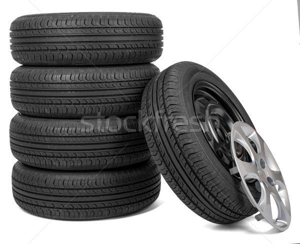 Closeup of five tires with wheel cap Stock photo © cherezoff
