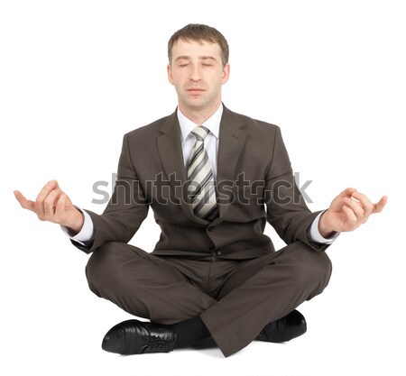 Businessman sitting in lotus posture Stock photo © cherezoff
