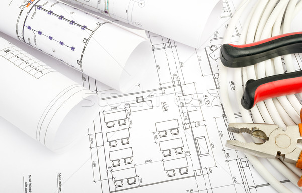 Architecture plan and rolls of blueprints Stock photo © cherezoff