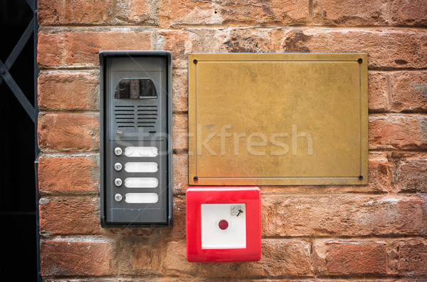 Entryphone on brick wall, close up view Stock photo © cherezoff