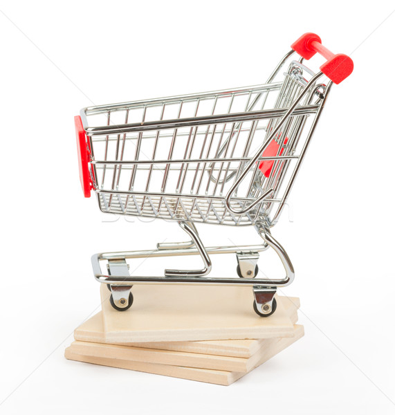 Shopping cart on paving tiles Stock photo © cherezoff