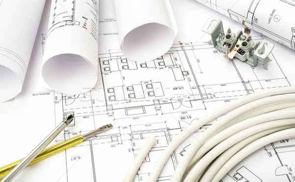 Stock photo: Architecture plan and rolls of blueprints